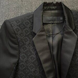 Zara black blazer with jacquard panel on top and sleeves.